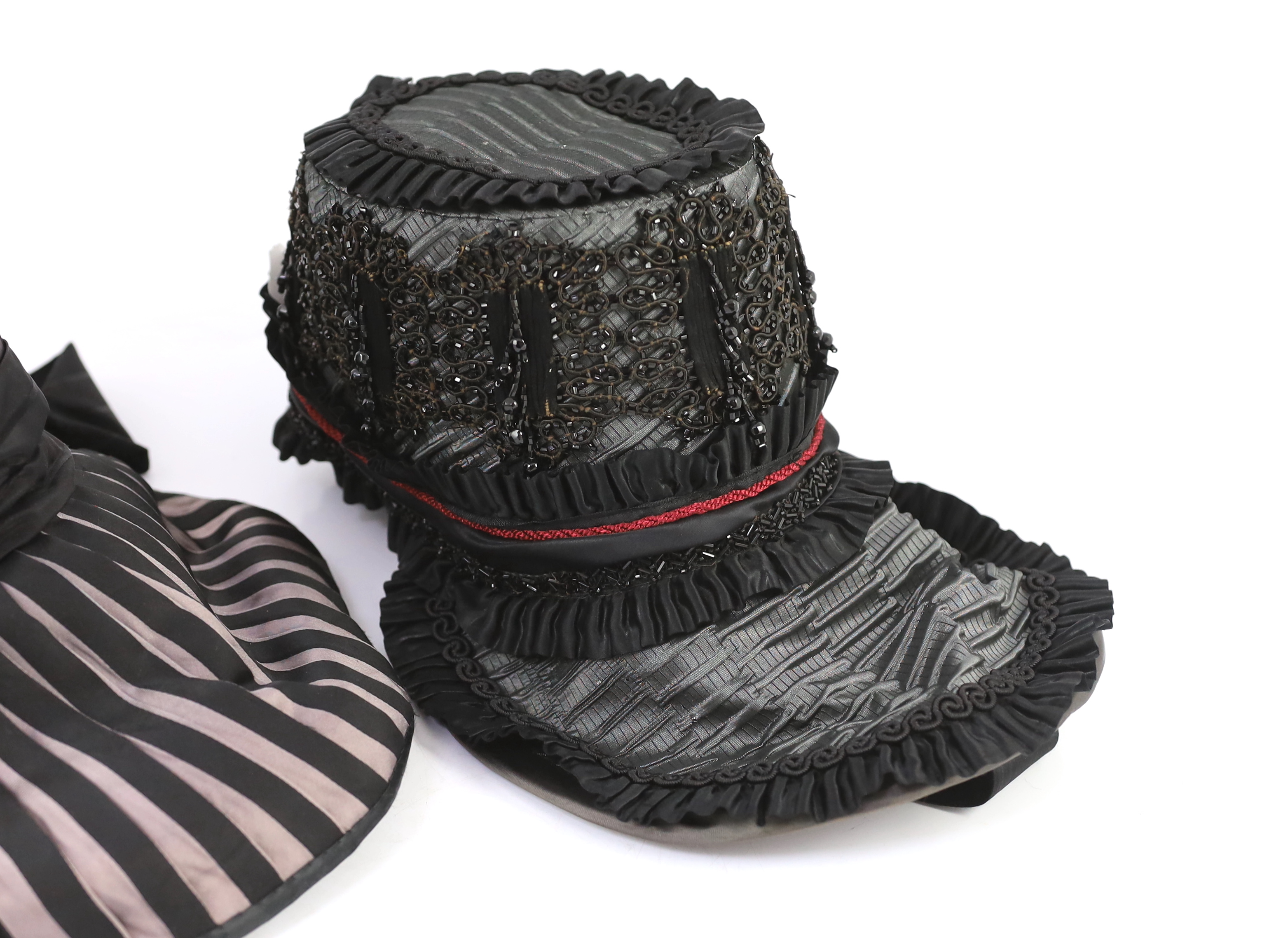 Two lady's Victorian style bonnets, silver and black striped and the other silver black with jet trim. Ex Royal Opera House 'The Damnation of Faust'